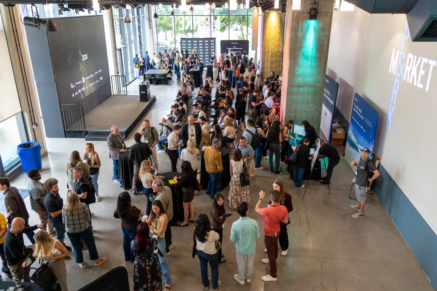 Attendees filling the atrium of UC San Diego Park & Market