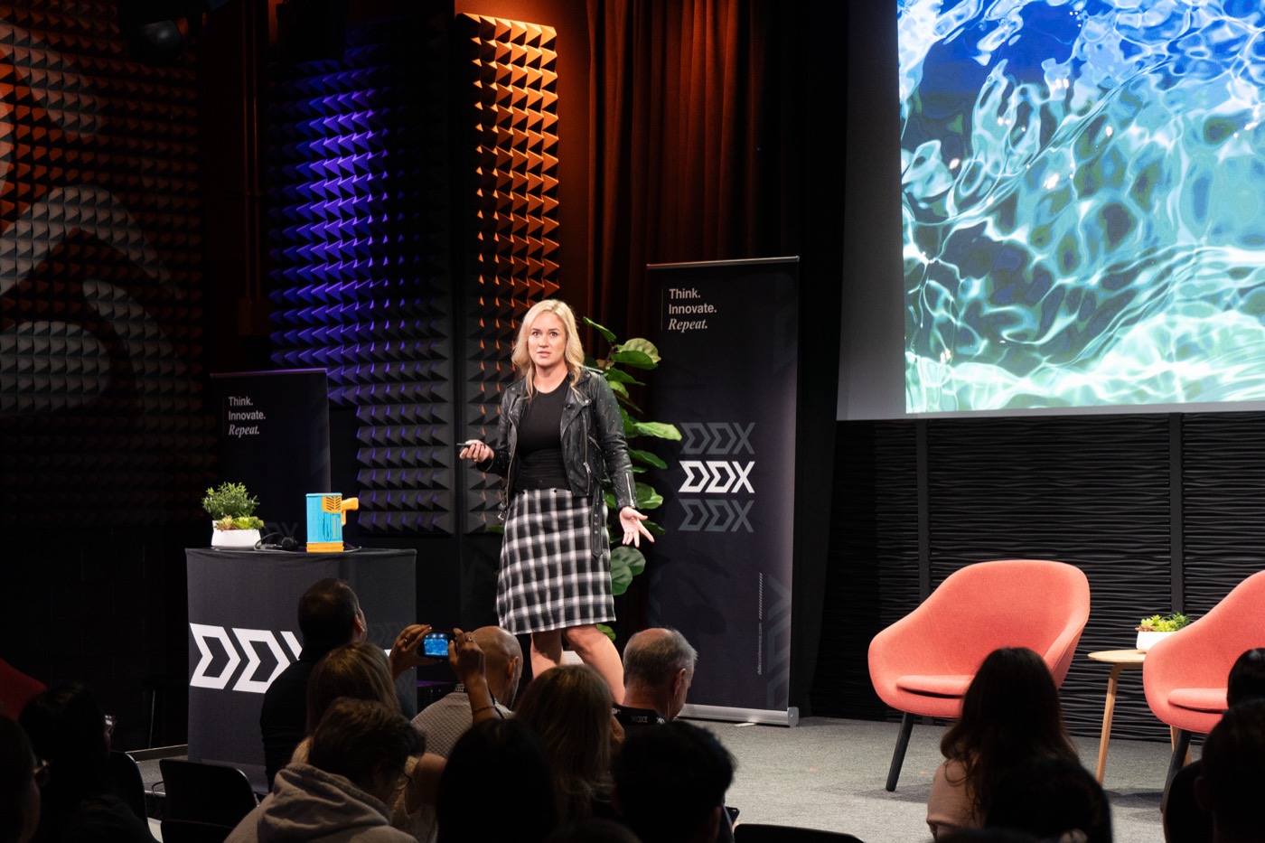 Rowan Salama presenting on the Forum stage
