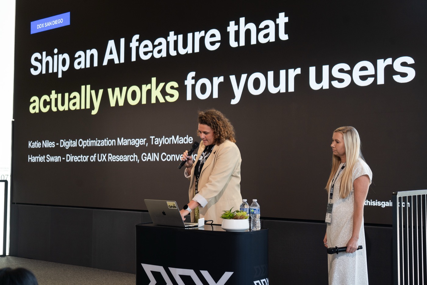 Harriet Swan and Katie Niles on stage with the title slide Ship an AI feature that actually works for your users
